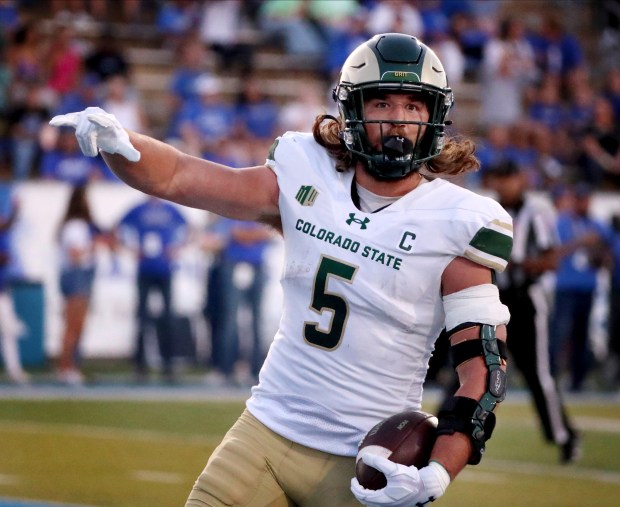 Colorado State tight end Dallin Holker runs in the ball for a touchdown against Middle Tennessee State during an NCAA college football football game in Murfreesboro, Tenn., Saturday, Sept. 23, 2023. (Helen Comer/The Daily News Journal via AP)