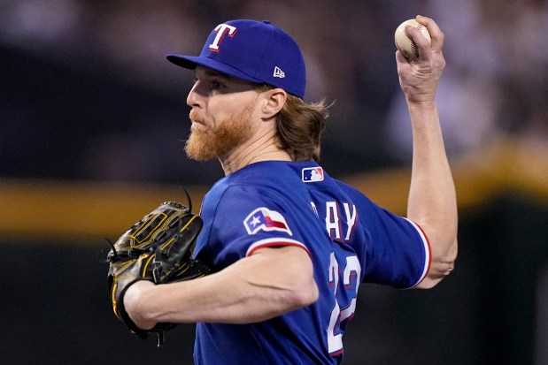 Texas Rangers starting pitcher Jon Gray throws against the Arizona Diamondbacks during the sixth inning in Game 3 of the baseball World Series Monday, Oct. 30, 2023, in Phoenix. (AP Photo/Brynn Anderson)