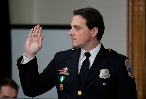 Washington DC Police Department officer Daniel Hodges is sworn in before testifying during a lawsuit to keep former President Donald Trump off the state ballot