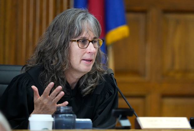 Denver District Court Judge Sarah B. Wallace presides over a trial in a lawsuit that seeks to keep former President Donald Trump off the state ballot