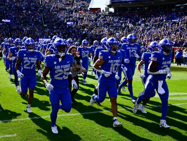 The Air Force Falcons take the field to play the Army West Point Black Knights at Empower Field at Mile High Stadium November 04, 2023. (Photo by Andy Cross/The Denver Post)