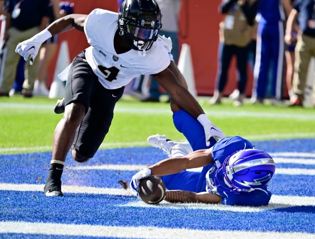 Air Force Falcons wide receiver Jared Roznos (13) wasn't able to handle the pass in the end zone against Army Black Knights defensive back Jabari Moore (4) in the second quarter at Empower Field at Mile High Stadium November 04, 2023. (Photo by Andy Cross/The Denver Post)