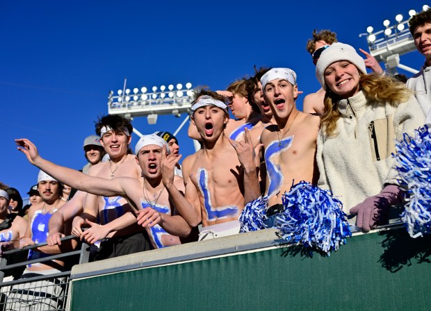 The Columbine Rebels student section gets fired up during the 5A Colorado State Championship football game against the Cherry Creek Bruins at Canvas Stadium in Ft. Collins on Saturday, Dec. 02, 2023. (Photo by Andy Cross/The Denver Post)