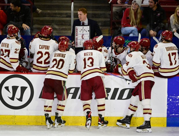 Denver Pioneers head coach David Carle talks to his team just before overtime against the St. Cloud State Huskies at Magness Arena November 04, 2022. The Pioneers lost 4-3. (Photo by Andy Cross/The Denver Post)