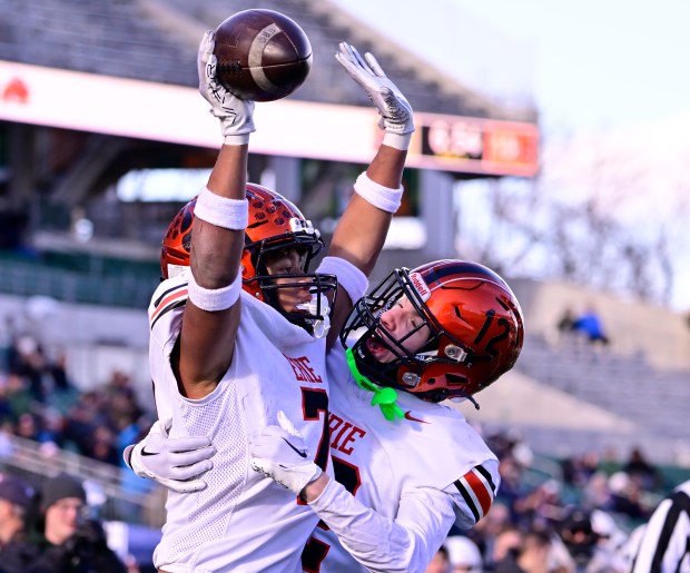 Erie Tigers RB Braylon Toliver (7), left, celebrates his touchdown against Palmer Ridge Bears with teammate Josh Levine (12) in the fourth quarter of the 4A Colorado State Championship football game at Canvas Stadium in Ft. Collins, Colorado on Saturday December 02, 2023. Tigers won 20-6. (Photo by Andy Cross/The Denver Post)