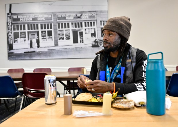 Volunteers of America client, Edward Hines, eats lunch at the Volunteers of America Colorado in Denver on Wednesday, Dec. 6, 2023. (Photo by Andy Cross/The Denver Post)